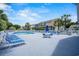 A community pool with plenty of deck chairs and a couple of tables at 118 Gully Branch Ln. # 3, Myrtle Beach, SC 29572