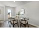 Cozy dining area with modern furnishings, including a wooden table and stylish chairs at 122 Bayou Loop # Lot 9, Surfside Beach, SC 29575