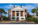 Front of the City Hall building with stately columns and lush landscaping at 1434 Porchfield Dr., Conway, SC 29526