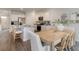 Open-concept kitchen and dining area with a view into the living room, creating an ideal space for entertaining at 1434 Porchfield Dr., Conway, SC 29526