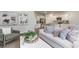 Open-concept design showcasing a living room connected to a kitchen with an island, fostering a seamless flow for modern living at 1434 Porchfield Dr., Conway, SC 29526