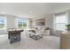 Cozy living room with a sectional sofa, modern coffee table, and a game table by the window at 1434 Porchfield Dr., Conway, SC 29526