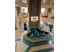 Open lobby with fountain feature and tile flooring at 1605 S Ocean Blvd. # 106, Myrtle Beach, SC 29577