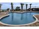 Large outdoor pool with chairs and ocean in the background at 1605 S Ocean Blvd. # 106, Myrtle Beach, SC 29577