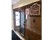 Sauna room with wooden door and safety sign at 1605 S Ocean Blvd. # 106, Myrtle Beach, SC 29577