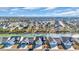 Aerial view of homes along a picturesque waterway featuring lush landscaping and community ponds at 166 New Paradise Way, Myrtle Beach, SC 29588