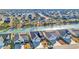 Extensive aerial view of a neighborhood surrounding a waterway with lush landscaping at 166 New Paradise Way, Myrtle Beach, SC 29588