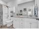Bathroom featuring white cabinets, granite countertops, shower-tub combo, and neutral wall color at 166 New Paradise Way, Myrtle Beach, SC 29588