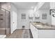 Bathroom featuring white cabinets, granite countertops, double sinks, and walk-in shower at 166 New Paradise Way, Myrtle Beach, SC 29588