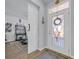 Stylish entryway with a sliding barn door, nautical decor, and a view into the living area at 166 New Paradise Way, Myrtle Beach, SC 29588