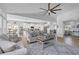 Large open-concept floor plan with a comfortable living room, modern kitchen, and dining area at 166 New Paradise Way, Myrtle Beach, SC 29588
