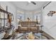 Bright living room featuring a bay window, comfortable seating, and decorative accents at 166 New Paradise Way, Myrtle Beach, SC 29588