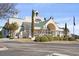 Charming Alabama Theatre featuring distinctive architecture and lush landscaping at 2005 Havens Dr., North Myrtle Beach, SC 29582