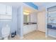 Bright bathroom with double sinks and granite countertops, ample storage, and modern fixtures at 2151 Bridge View Ct. # 2-902, North Myrtle Beach, SC 29582