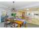 Cozy dining room with seating for six and an open view of the kitchen at 2151 Bridge View Ct. # 2-902, North Myrtle Beach, SC 29582