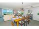 Inviting dining area with seating, open floor plan, and water views at 2151 Bridge View Ct. # 2-902, North Myrtle Beach, SC 29582