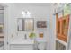 Clean bathroom featuring a mirror, sink, and window at 2166 Marion Circle, Little River, SC 29566
