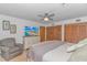 Spacious main bedroom with natural light, hardwood floors, and built in closet at 2166 Marion Circle, Little River, SC 29566