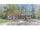 Charming single-story home featuring a screened-in porch and inviting curb appeal at 2166 Marion Circle, Little River, SC 29566