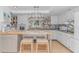 Bright kitchen with modern appliances, ample counter space, and dining table island at 2166 Marion Circle, Little River, SC 29566