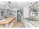 Kitchen featuring a butcher block island, stainless steel sink, and modern pot rack at 2166 Marion Circle, Little River, SC 29566