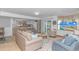 Cozy living room with hardwood floors and plenty of natural light showcasing an open floor plan at 2166 Marion Circle, Little River, SC 29566