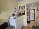 Efficient, galley-style kitchen is conveniently accessible from the living area at 2204 S Perrin Dr. # 3, North Myrtle Beach, SC 29582