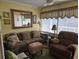 Relaxing living room offers comfortable seating and scenic outdoor views at 2204 S Perrin Dr. # 3, North Myrtle Beach, SC 29582