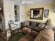 Cozy living room featuring a comfortable sofa, recliner and built-in shelving at 2204 S Perrin Dr. # 3, North Myrtle Beach, SC 29582