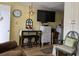 The room includes a dining area, TV, dresser storage and chair seating at 2204 S Perrin Dr. # 3, North Myrtle Beach, SC 29582