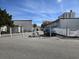 View of the parking area, with two bikes parked in the foreground at 2204 S Perrin Dr. # 3, North Myrtle Beach, SC 29582