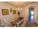 Dining area featuring decorative wall hangings and seating for six at 2241 Waterview Dr. # 134, North Myrtle Beach, SC 29582