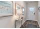 Inviting entryway with modern console table, stylish decor, and sleek flooring at 2844 Riverboat Way, Conway, SC 29526