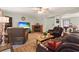 Comfortable living room features a fireplace, plush leather seating, and neutral-toned rug at 390 Boundary Ave., Murrells Inlet, SC 29576