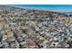 Wide aerial shot of houses near the coast, with beaches and water visible at 6001- 5411 S Kings Highway, Myrtle Beach, SC 29575