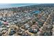 Aerial view of a community near water, revealing diverse housing and roads at 6001- 5411 S Kings Highway, Myrtle Beach, SC 29575