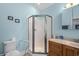 Bathroom featuring a shower, vanity, tile floor and light blue walls at 6001- 5411 S Kings Highway, Myrtle Beach, SC 29575