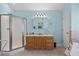 Bathroom featuring a shower, vanity, tile floor and light blue walls at 6001- 5411 S Kings Highway, Myrtle Beach, SC 29575