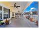 Large covered deck featuring ceiling fans, ample seating, and views of the surrounding neighborhood at 6001- 5411 S Kings Highway, Myrtle Beach, SC 29575