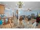 Open-concept living and dining area with a chandelier, hardwood floors, and plenty of space for entertaining at 6001- 5411 S Kings Highway, Myrtle Beach, SC 29575