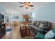 Spacious open living area with ceiling fan, dining table, and easy access to kitchen at 6001- 5411 S Kings Highway, Myrtle Beach, SC 29575