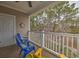 Inviting balcony with comfortable seating and serene wooded views at 6015 Catalina Dr. # 734, North Myrtle Beach, SC 29582