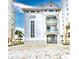 Exterior shot of a beach cabana featuring balconies and ample parking at 6015 Catalina Dr. # 734, North Myrtle Beach, SC 29582