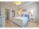 Serene main bedroom featuring a ceiling fan and an en-suite bathroom at 6015 Catalina Dr. # 734, North Myrtle Beach, SC 29582