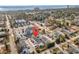 Aerial view of townhomes near the beach, with a community pool and ample parking at 6312 Wedgewood St. # F, Myrtle Beach, SC 29572