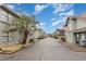 Street view of townhomes with lush landscaping and a clear view of the sky at 717 41St Ave. S, North Myrtle Beach, SC 29582