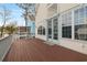 Exterior view of a wood deck with access to the exterior and a door to the home at 720 Melody Ln., Surfside Beach, SC 29575