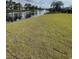 Lush green lawn extends to a tranquil pond with a fountain feature at 740 Jade Dr., Myrtle Beach, SC 29579