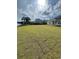 Expansive lawn area perfect for outdoor activities and relaxation, with lake view at 740 Jade Dr., Myrtle Beach, SC 29579