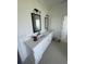 Bathroom with dual sink vanity, modern fixtures, and plenty of counter space at 740 Jade Dr., Myrtle Beach, SC 29579